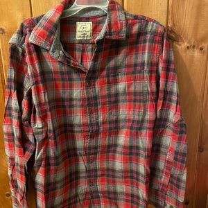 A red flannel presented by Woven Goods